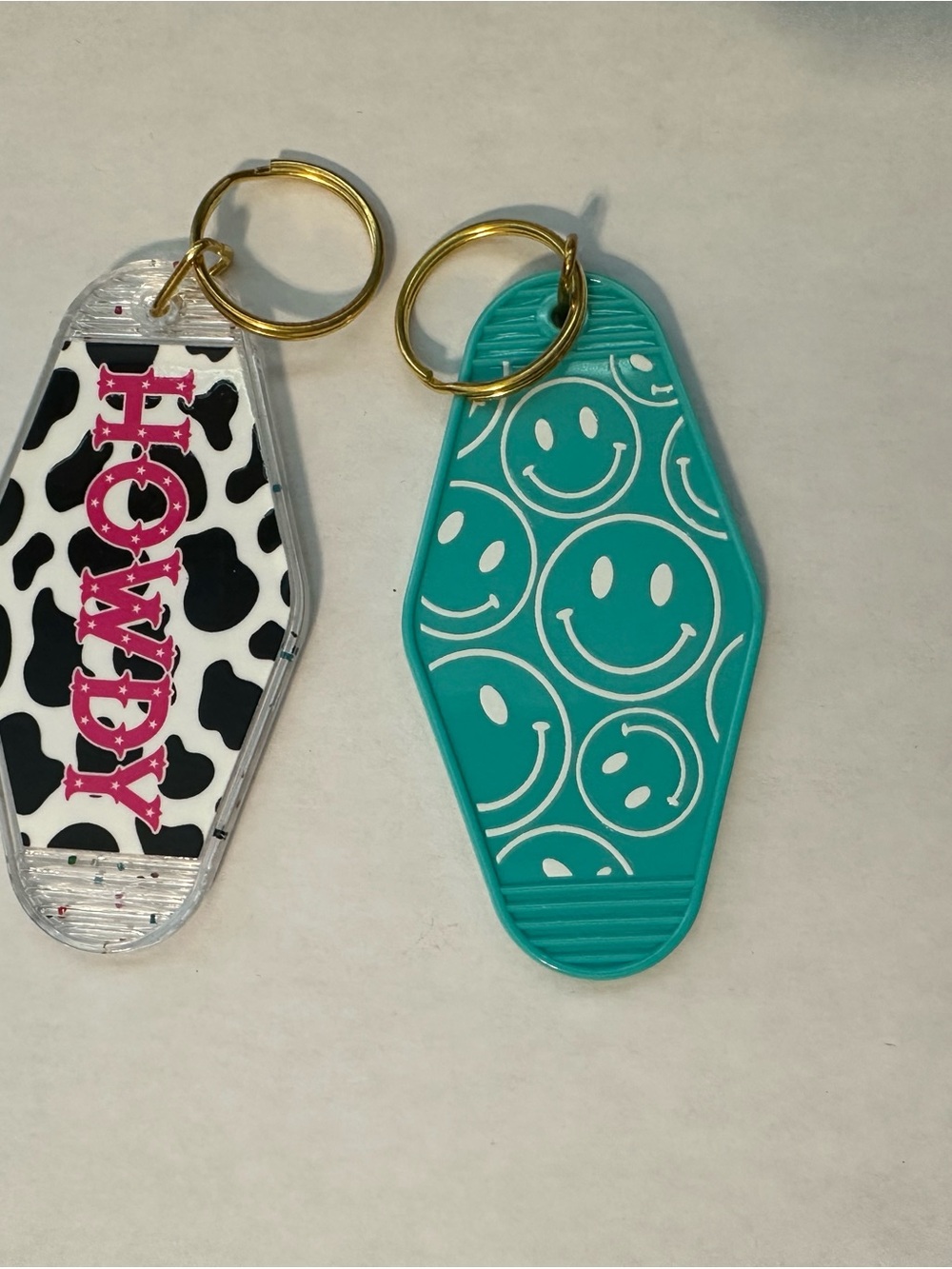 Teal Smiley Motel Keychain Duo - Teal & Black/White